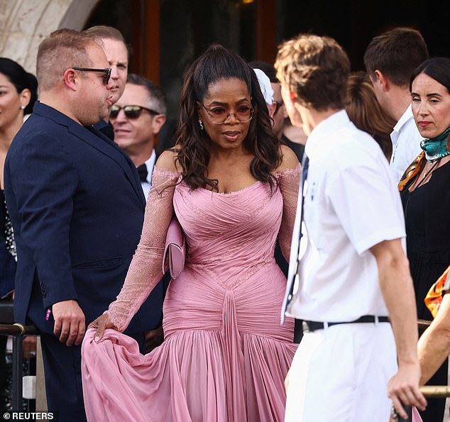 A-List stars including Oprah Winfrey [pictured], Ivanka Trump and Usher are among stars who've traveled to the private island by water to watch the romantic nuptials take place