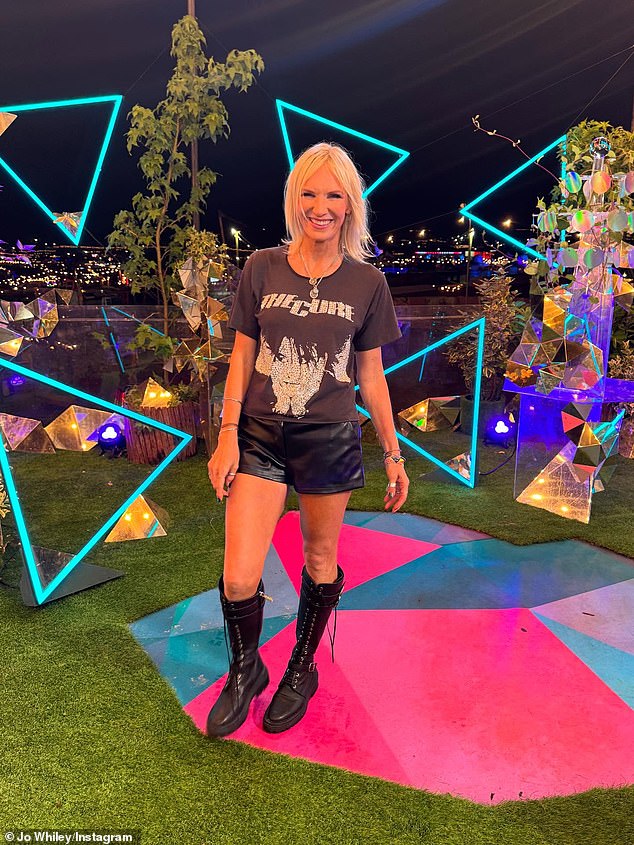 In the snaps, Jo looked nothing short of sensation in black leather shorts and a bedazzled The Cure top