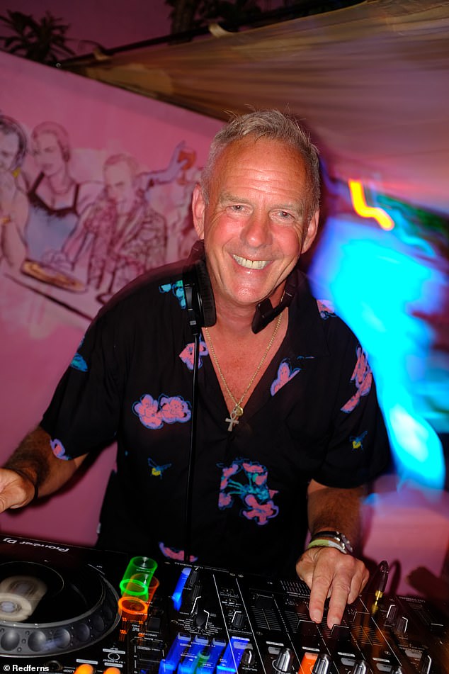 Her companion, who was tall and boasted salt and pepper hair just like Fatboy Slim, 61, held her hand as they made their way through Worthy Farm's VIP area (Norman pictured 2021)