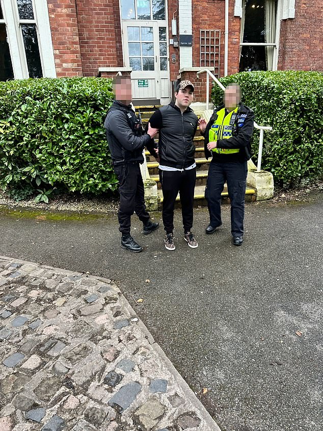 Watkin ¿ dressed in matching leopard print trainers and baseball cap ¿ is handcuffed by police officers in Alderley Edge last March