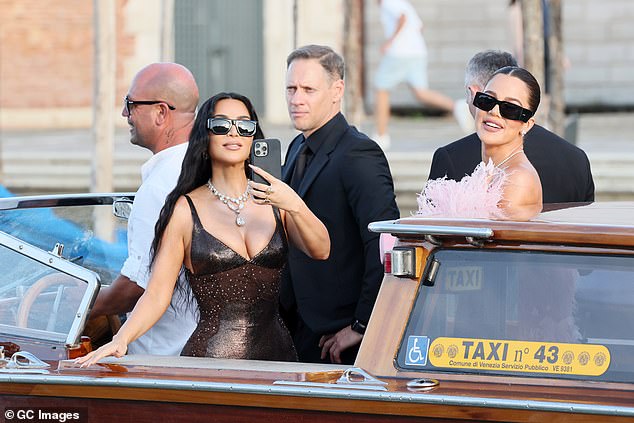Kim made sure to commemorate the occasion as she snapped away on her phone