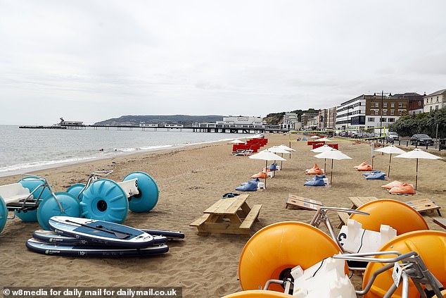 Sunbeds, kayaks and paddleboards are available to rent from the seafront business