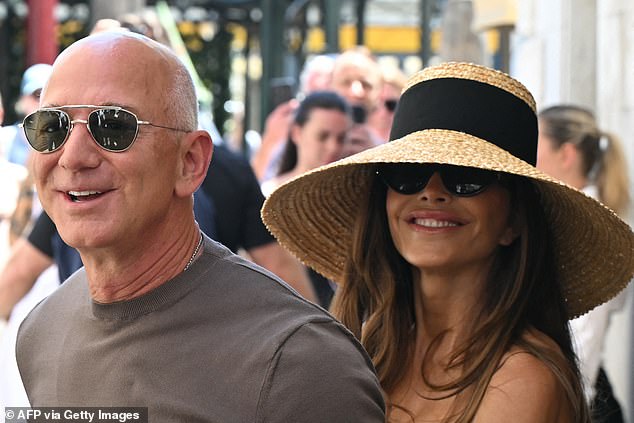 The newlyweds smiled and waved at cameras as they stepped out in Venice today