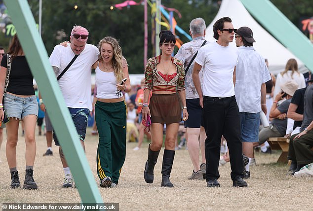 She got into the festival spirit as she and Marco enjoyed the second day of the action