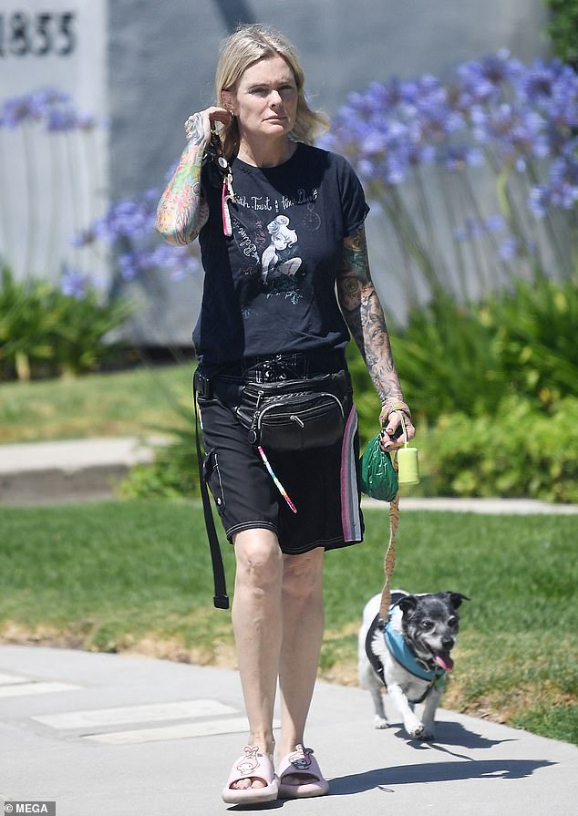 The most obvious changes was the sleeves of tattoos on her arms running from under her T-shirt sleeves all the way to her hands