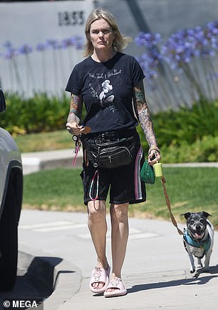 She said she started her tattoos on her back in her 'late 20s,' after her stint on Baywatch. 'Every tattoo that I have is significant of something,' she said