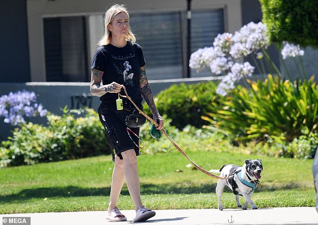 Erika looked worlds apart from the clean-cut blonde who previously graced television screens across the nation