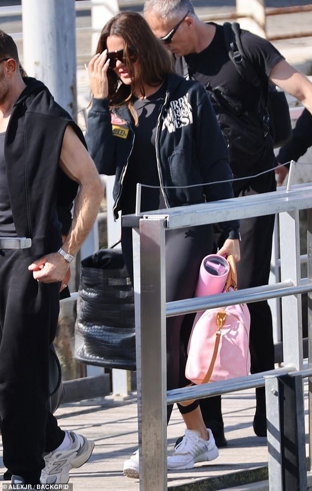 Khloe Kardashian, 41, opted for comfort like her sister, and sported what appeared to be a workout outfit of tights, sneakers, and a bomber jacket. The ensemble was very low effort and seemed to be thrown together last minute