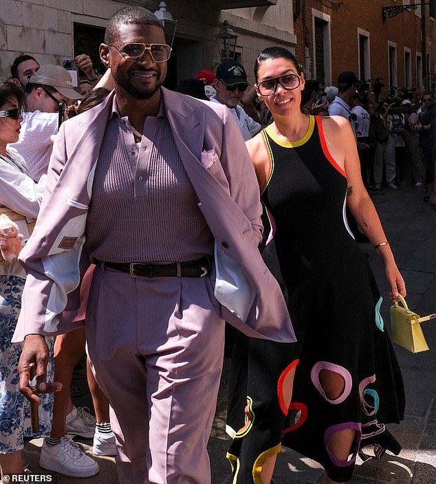Usher, 46, and his wife Jennifer Goicoechea, 41, walked through the streets in somewhat messy ensembles. The pop star wore a three-piece purple suit with mismatching material - which looked like the wrong choice for the European summer heat. Goicoechea's Christopher John Rogers dress made of circle cut-outs also fell flat
