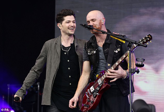 'There's one person I really wish was here to see this. He was on the stage 17 years ago. We lost my best mate and the founding member of The Script Mark Sheehan' [Danny and Mark pictured in 2013]