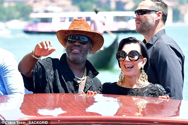 Kris cut a stylish figure in a black lace ensemble which she styled with chunky gold earrings
