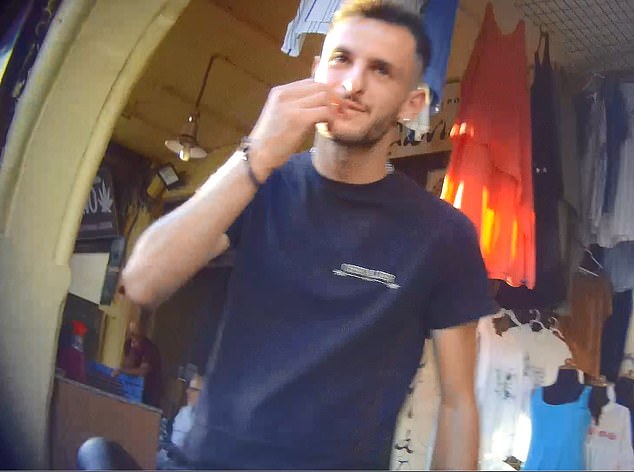 As our reporter stops briefly to look at the menu to the side of Polloniatissa, a waiter comes over and signals whether she wants to dine on the rooftop