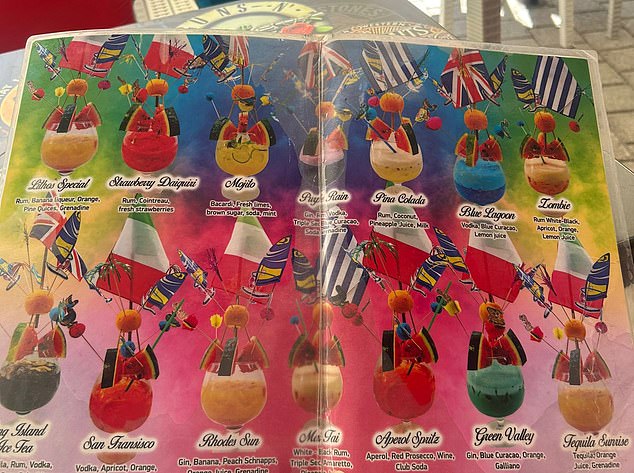 One of many cocktail menus that did not have any price or size indications besides pictures of fishbowls with different flags