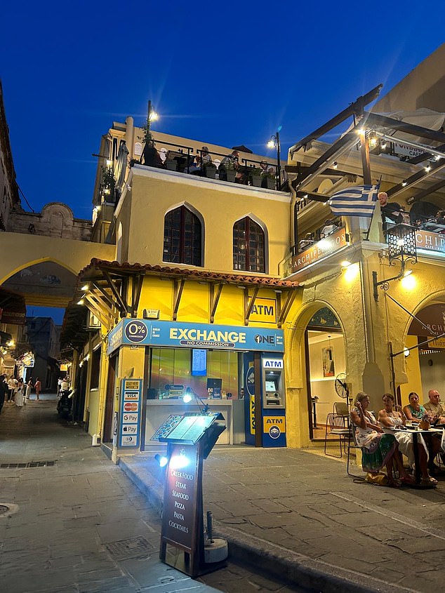 There were at least four ATMs in the fairly small Hippocrates Square which is filled with busy restaurants and bars