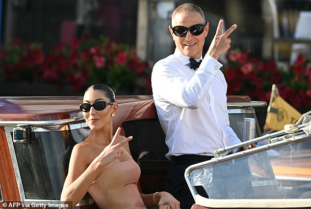 US fashion designer Sarah Staudinger and US talent agent Ari Emanuel leave the Gritti Palace Hotel on the wedding day of Amazon founder Jeff Bezos with Lauren Sanchez, in Venice on June 27, 2025
