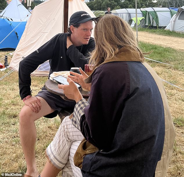 The actor was spotted by festival-goers at Glastonbury enjoying a spot of breakfast with his wife Celina Bassili