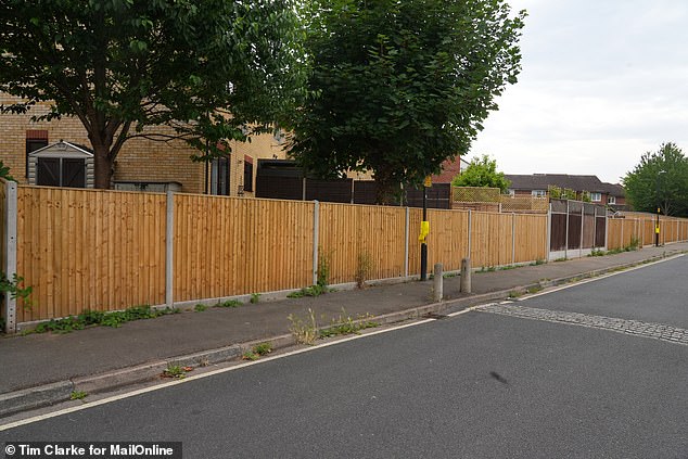 Five homeowners in Ramsey Court, in Slough, Berkshire and five more in the adjacent road, St Michael's Court, purchased an undeveloped strip of land at the rear of their properties from Taylor Wimpey and erected this fence