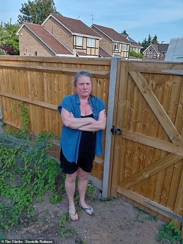 She told MailOnline that between purchasing the land, solicitor's fees and erecting the fence, she had spent £6,000 - but risks losing that investment after being refused council permission