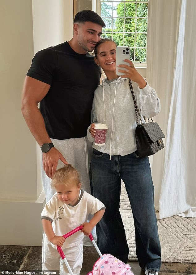 Tommy and Molly-Mae pictured with their two-year-old daughter Bambi