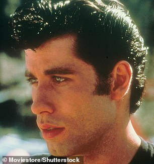 The actor donned a wig fashioned in a greaser-friendly ducktail like the style his character Danny Zuko sporte