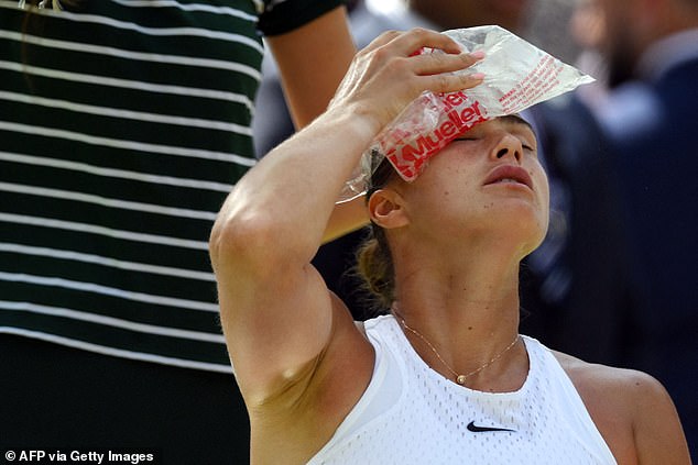 Belarus' Aryna Sabalenka put an ice bag on her head to cool off at Wimbledon in 2023