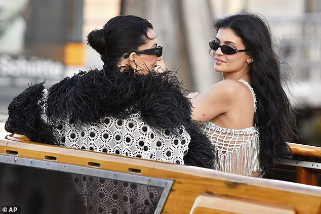 Kylie Jenner and Kris Jenner looked stylishly windswept as they travelled through the canal