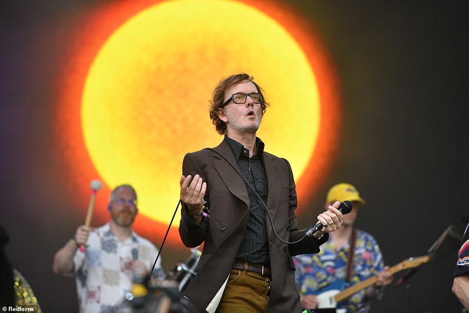 The Britpop icons were concealed as mystery band Patchwork - later revealing themselves on the famous Pyramid Stage after 30 years (pictured)