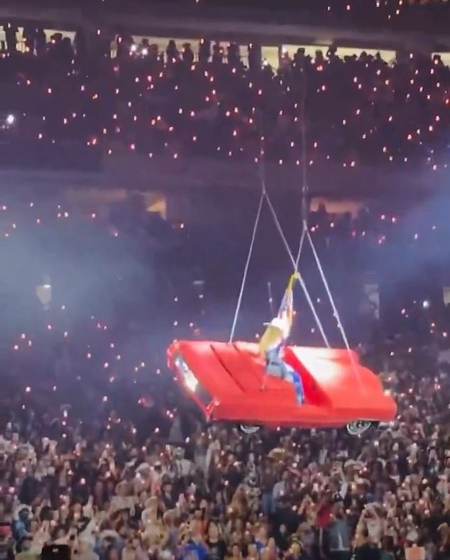 The car was safely lowered down onto the stage