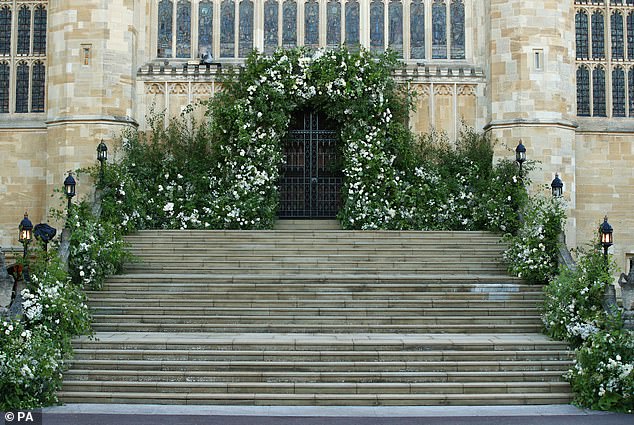 When guests walked into St. George's Chapel at Windsor Castle they were greeted by an elaborate archway of white peonies and white garden roses, Diana's favorite flowers
