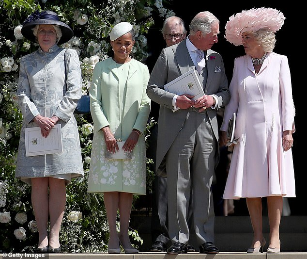 From Left: Baroness Fellowes, Doria Ragland, Baron Fellowes, Prince Charles and Camilla are pictured after the wedding of Harry and Meghan
