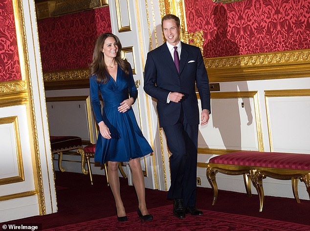 William and Kate arrive to pose for photographs in the State Apartments of St James Palace on November 16, 2010