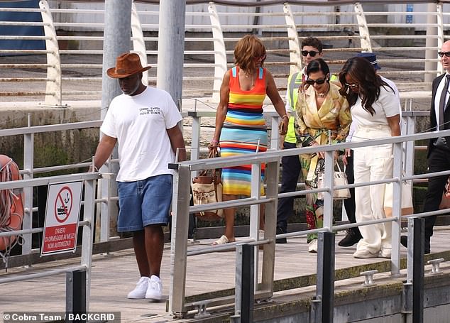 Kris, 69, and Oprah, 71, walked arm-in-arm down the dock, alongside Gayle King and Kris' boyfriend Corey Gamble