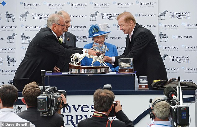 Bernard Kantor (left) is seen with the Aga Khan, Queen Elizabeth II and horse trainer Dermot Weld after the horse Harzand won the Investec Derby in June 2016