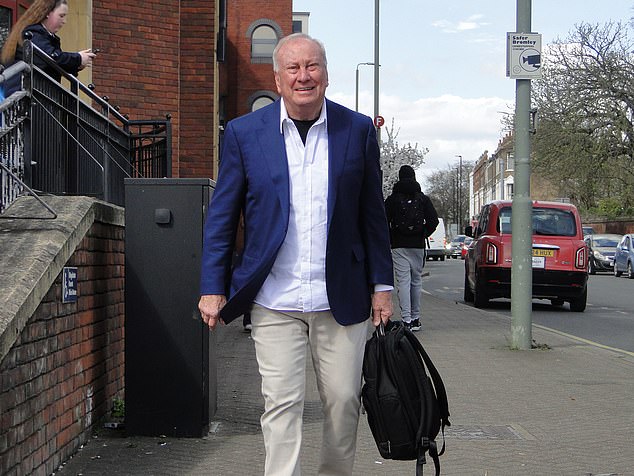 The businessman, seen outside Croydon Magistrates' Court, has been given a driving ban
