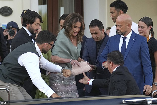 Rania who is married to King Abdullah - opted to pair her glamorous ensemble with diamond jewellery and a cream patterned clutch bag, as to not draw focus away from her designer look