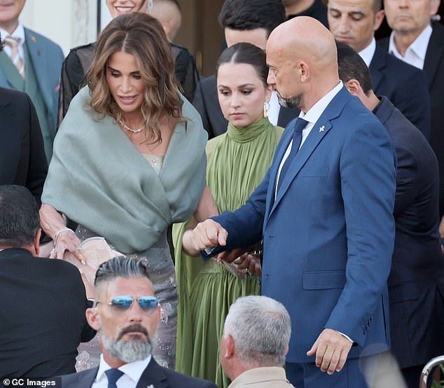The royal, 54, snapped as she was helped by several security men onto a water taxi in Venice alongside her daughter, Princess Iman