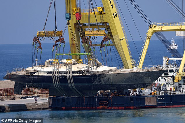 Crane ship Hebo Lift 10 raising the wreck of superyacht Bayesian that sank off Sicily on August 22, 2024 -- June 22, 2025