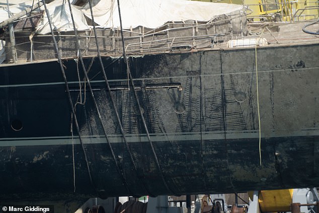 The operation to bring Bayesian to the surface had involved divers and remote operated vehicles attaching lines beneath the hull