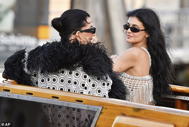 Kylie Jenner and Kris Jenner looked stylishly windswept as they travelled through the canal