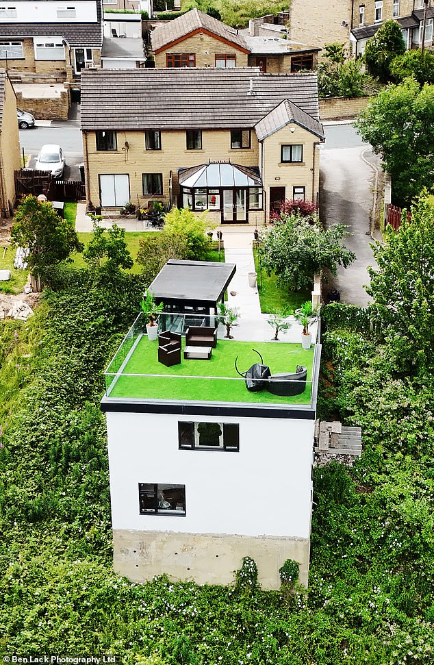 The American-born father-of-one said he wanted to 'bring a slice of California ' to West Yorkshire with his bunker-like creation, cleverly hidden from view by the railway embankment below and visible only to passing trains
