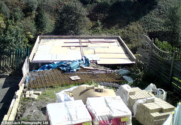 Mr Khan said he believes a neighbour's complaint was the source of the council's ire (Pictured: construction phase)