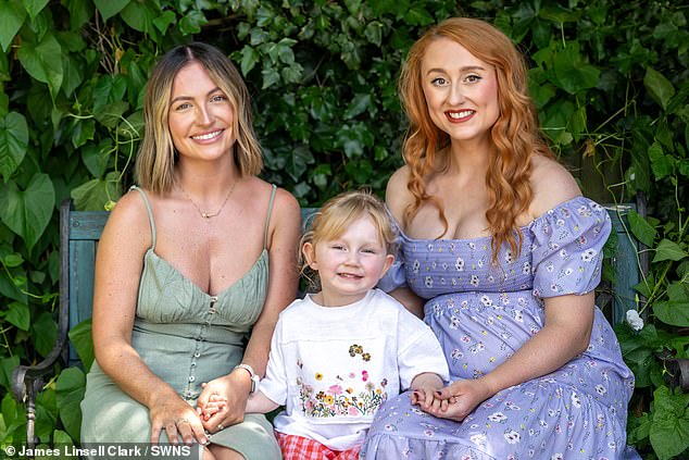 Georgia with her friend Daisy, who is carrying her baby, alongside Daisy's daughter Emily
