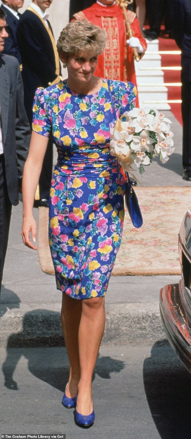 The vibrant blue floral frock - which Diana had worn during her tour of Australia with Charles - cost her $400,000 (a total of $520,000 with all fees added)