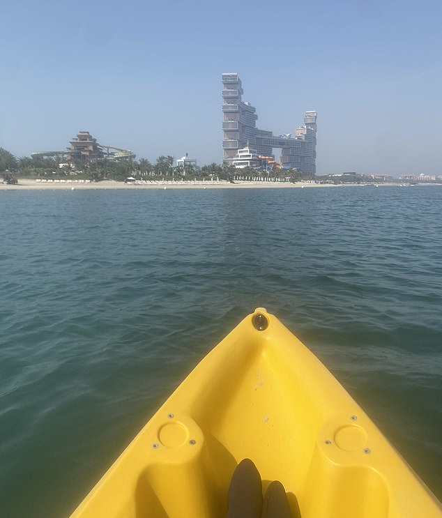 Paddling at leisure beside Aquaventure Beach, a short (walkable) distance away from the park