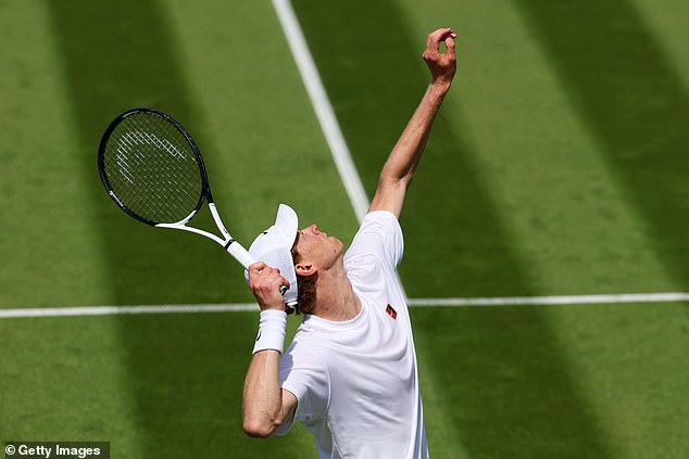 Jannik Sinner of Italy serves on the practice courts prior to The Championships Wimbledon 2025 at All England Lawn Tennis and Croquet Club on June 25, 2025