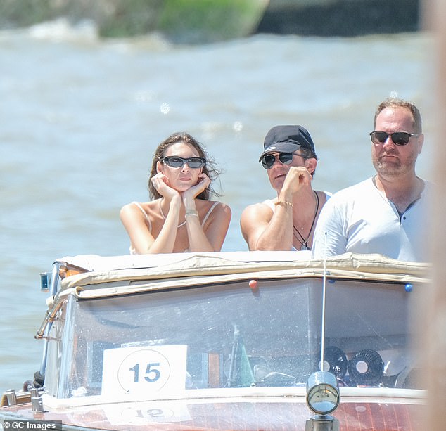 As Leo disappeared to the lower decks, the model remained stood up at the back of the boat and chatted to Orlando as they sped towards the mainland