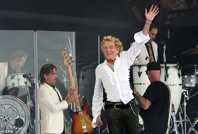 After a rendition of Some Guys Have All The Luck, he stopped to catch his breath and remove his sparkling jacket in the searing heat, telling fans: 'This is so lovely. I'm so excited I can hardly breathe'