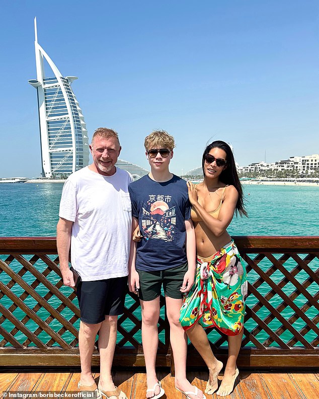 A smiling Becker poses with his wife and Amadeus during an Easter trip to Dubai