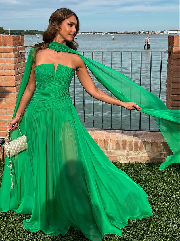The Honest Company founder was clad in a strapless look with a matching scarf draped over her neck