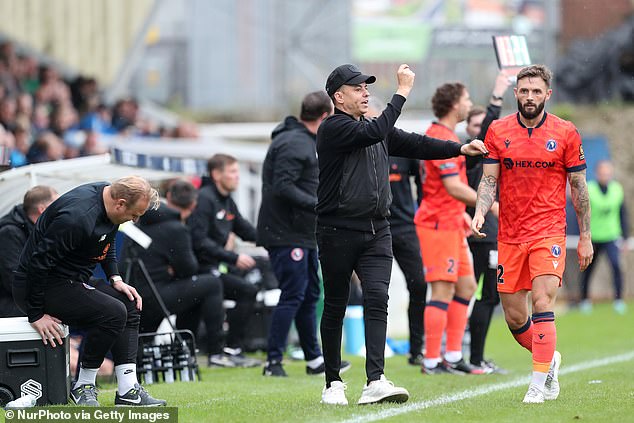 White, who also owns Dorking, was charged by the FA with using insulting or abusive words